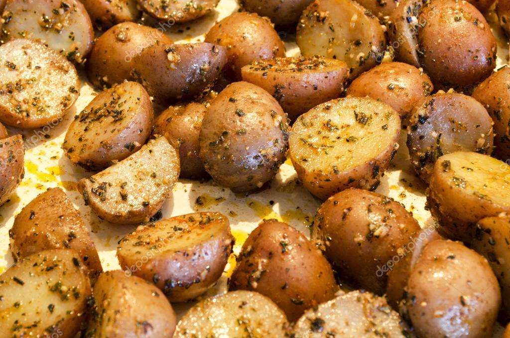 Baked small potatoes.  Stock Photo © Nataliya999 #73322325