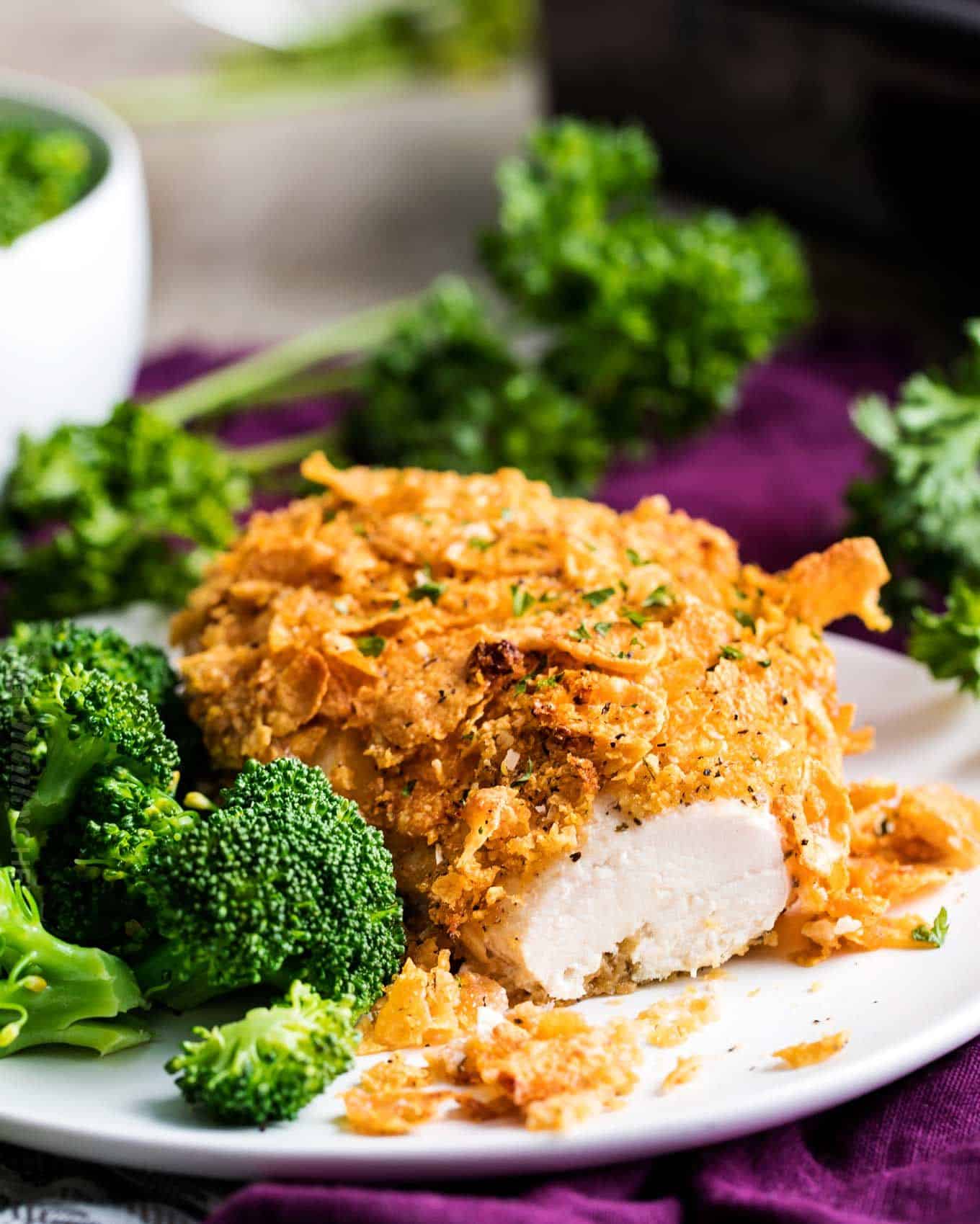Crunchy, juicy baked chicken made by slathering chicken breasts in ...