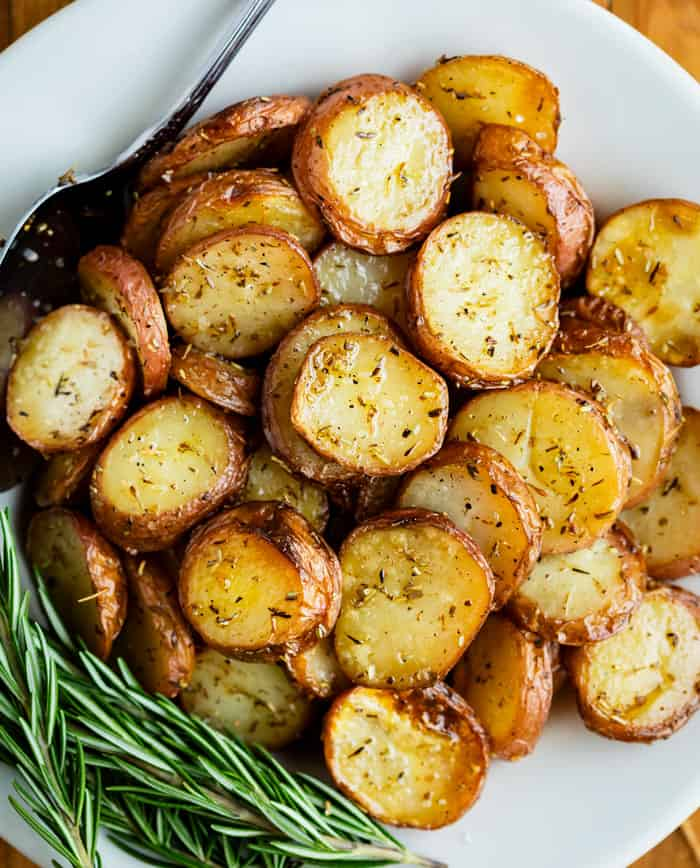 Seasoned Grilled Potatoes in a white bowl.