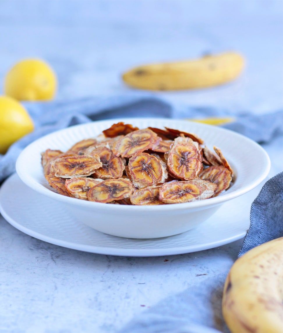 This homemade Baked Banana Chips recipe is made with 2 ingredients only ...